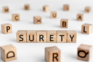surety spelled out in wood blocks
